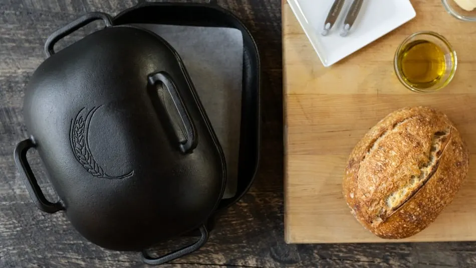 Sourdough loaves baked in round vs. oval Dutch ovens – shape comparison.